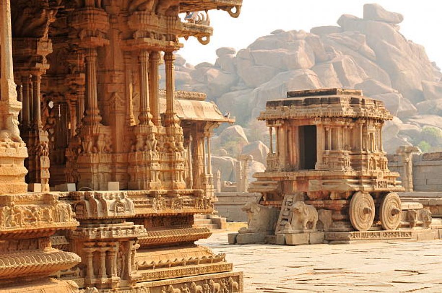 What makes Hampi a must-visit for history and architecture enthusiasts?